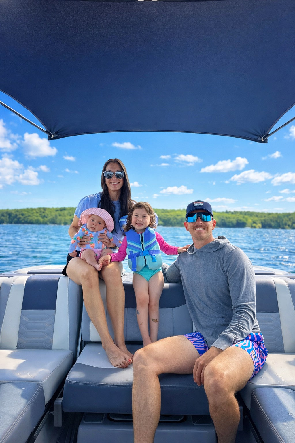 Family Enjoying the Shoreline Brands Sunshade Bimini Extension